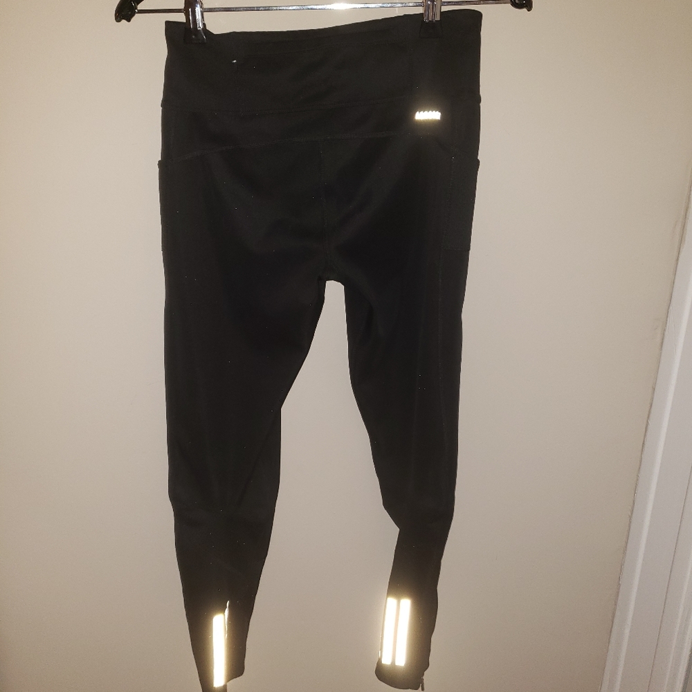 Adidas drawstring spandex tights. RUNNING. Size S. Reflective with 4 pockets